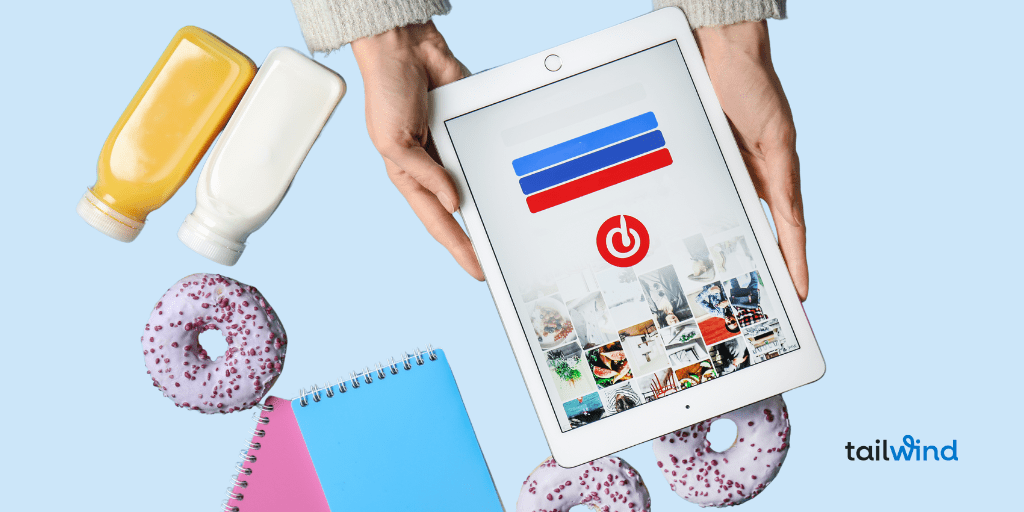 Hands hold a tablet displaying a social media app, surrounded by colorful donuts, juice bottles, and notebooks on a light blue background. Tailwind logo visible.