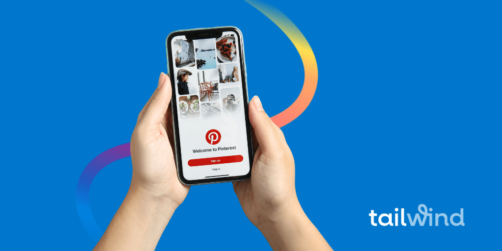 Image of hands holding a smartphone, and the screen is showing Pinterest's homepage. The Tailwind logo on a blue background.