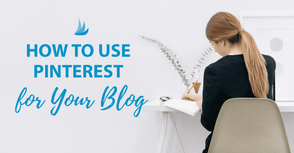 A woman with light brown hair sits at a white desk writing in a notebook. Blue text reads: "How to use Pinterest for your blog." The minimalist décor, featuring a plant and framed artwork, sets the scene for mastering Pinterest blogging tips.