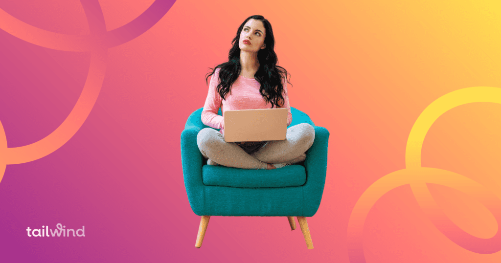 Woman sitting cross-legged on a chair holding her laptop on her lap while looking to her left as if thinking against a magenta and orange background with Tailwind in white font.