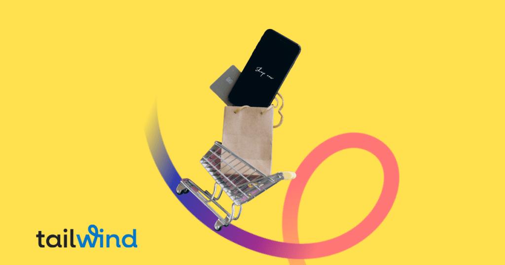 Image of a mini shopping cart with a paper bag and credit card in it on a yellow background and the word Tailwind in the corner. 