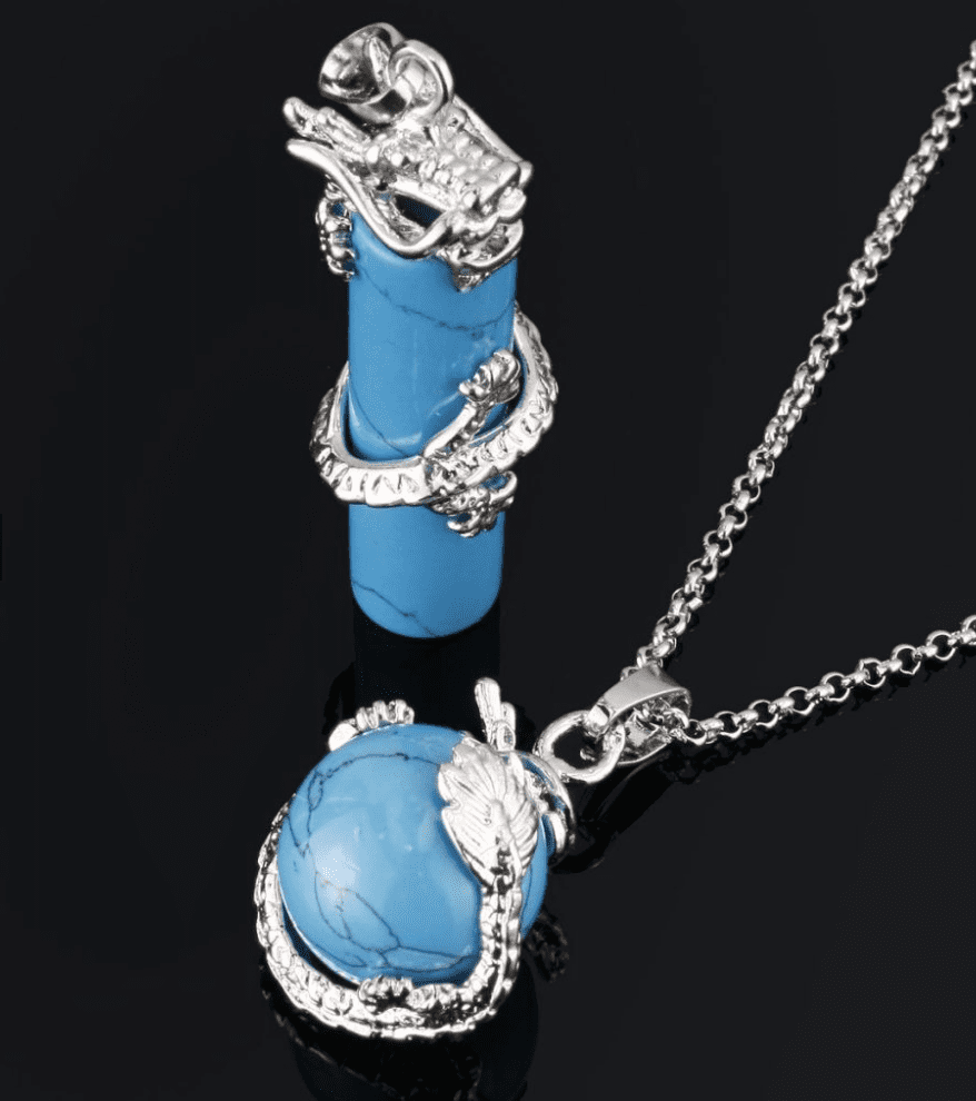 Screenshot of a photo of turquoise and silver jewelry on a black background.
