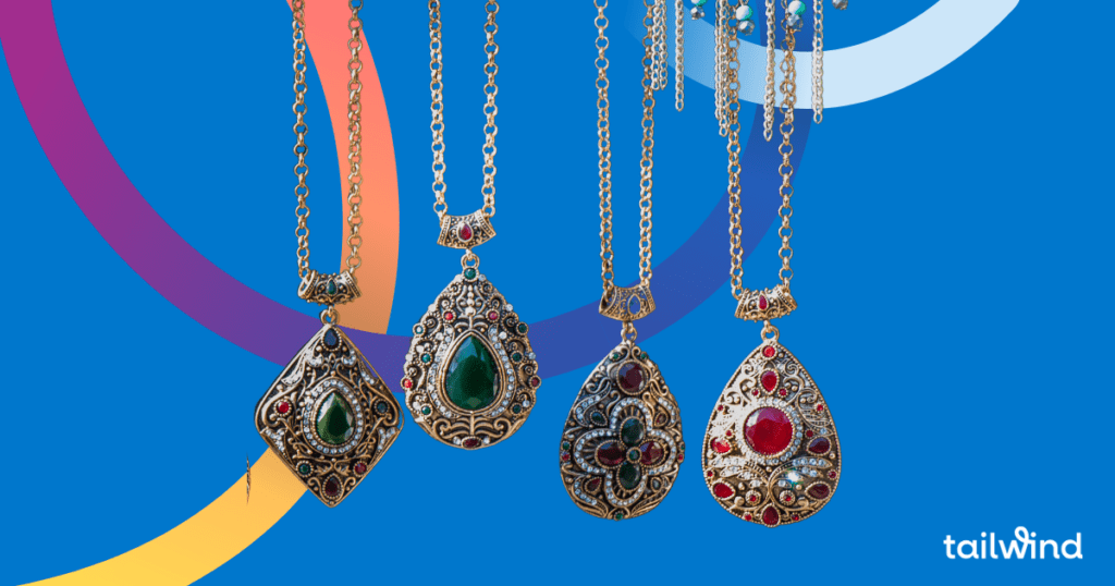Photo of four ornate necklaces hanging against a blue background with the word Tailwind in white in the lower right corner.