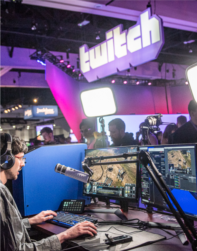 Photo of a gamer live-streaming at a Twitch event