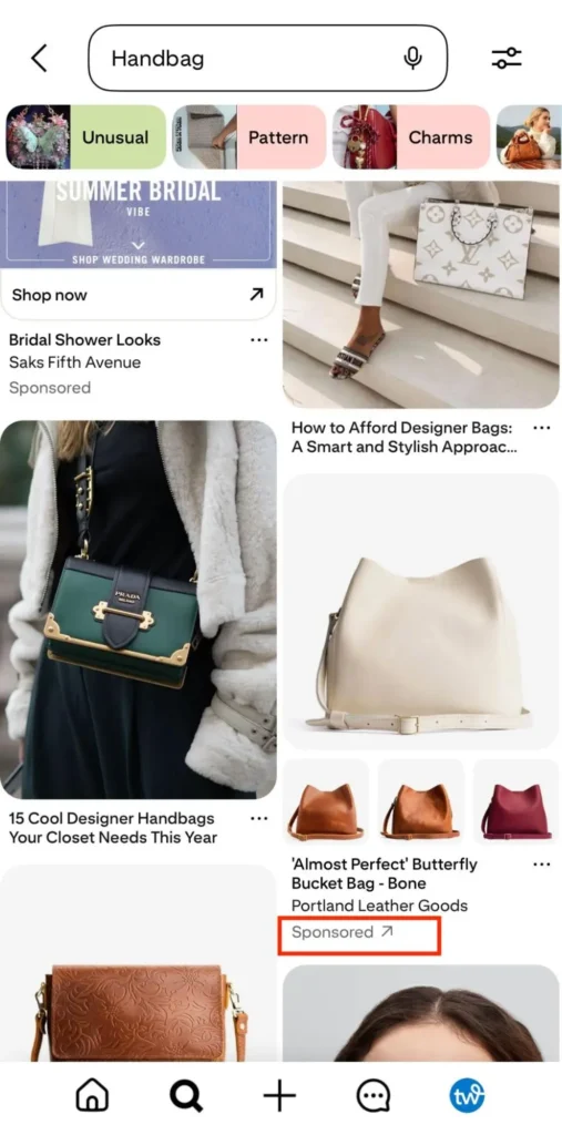 Sponsored Pin ad of a brown leather bag with a read square highlighting the word "sponsored" beneath the image.