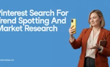 Blog banner with text 'Pinterest Search For Trend Spotting And Market Research' featuring a woman holding a smartphone, highlighting Pinterest search trends.