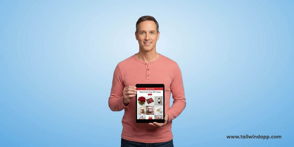 Man in pink shirt holding a tablet displaying Valentine's Day marketing ideas on Pinterest.